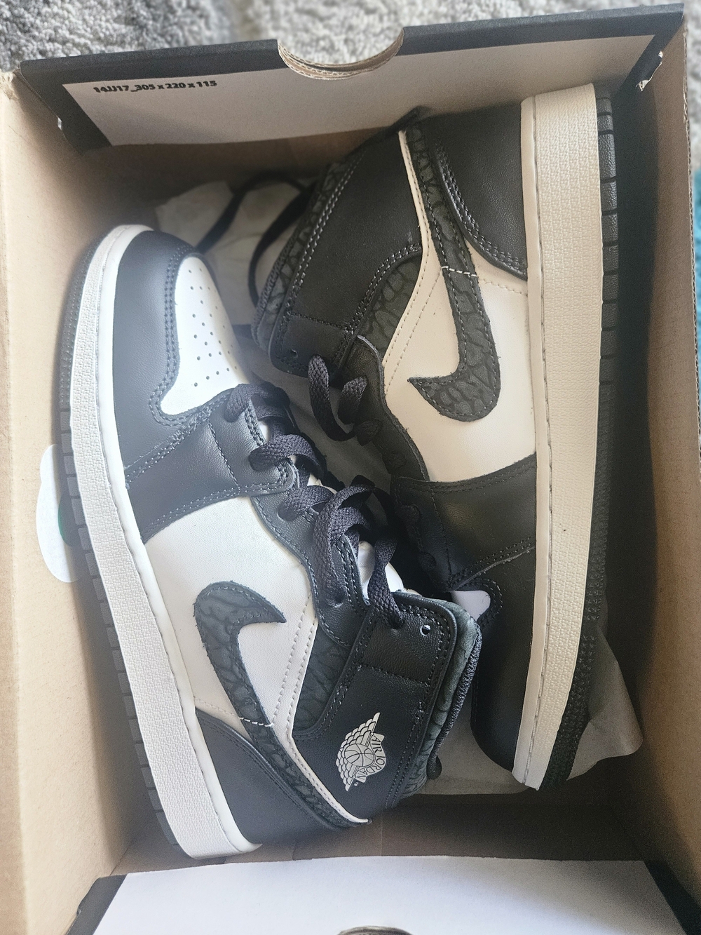 Jordan Kids Black and White High-Top Sneakers